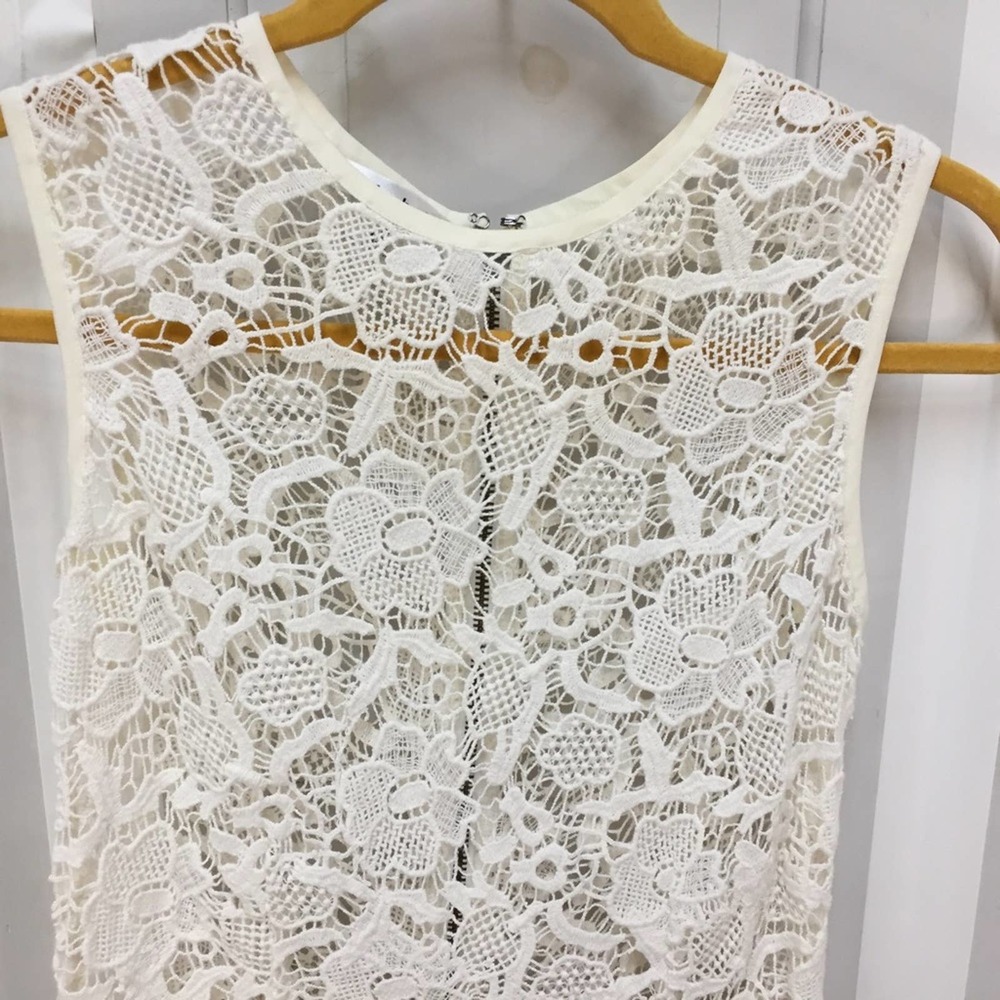 CAbi White Crocheted Lace Sheer Peplum Top - Picture 5 of 16